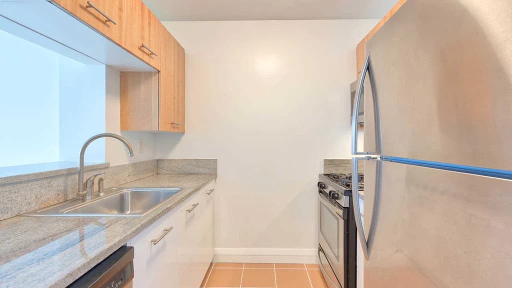 Kitchen with Granite Countertops and Stainless Steel Appliances
